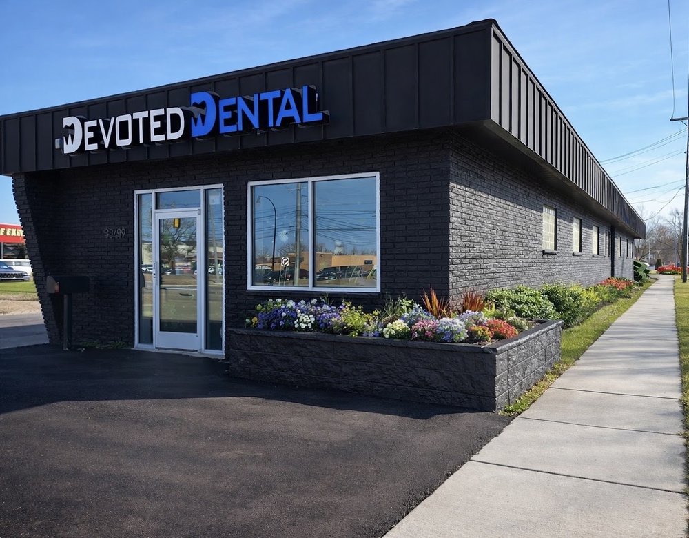 Devoted Dental Group family dental office in Livonia, Michigan on Plymouth Road near I-96, accepting Medicaid